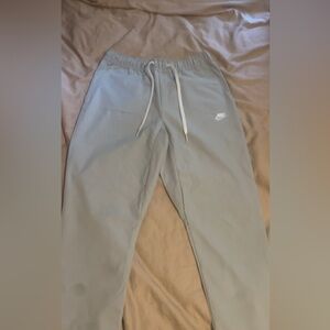 Nike Nylon regular fit pants.